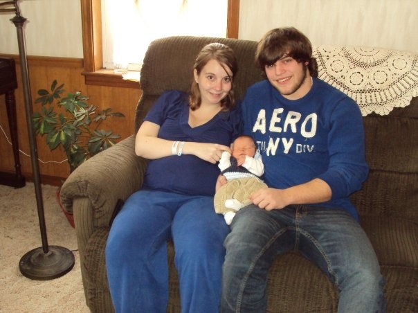 No one warned me I would still be poofy and look pregnant when I left the hospital, so at least I know this time! :) This is our first family photo- look how young and naive Corey and I look!